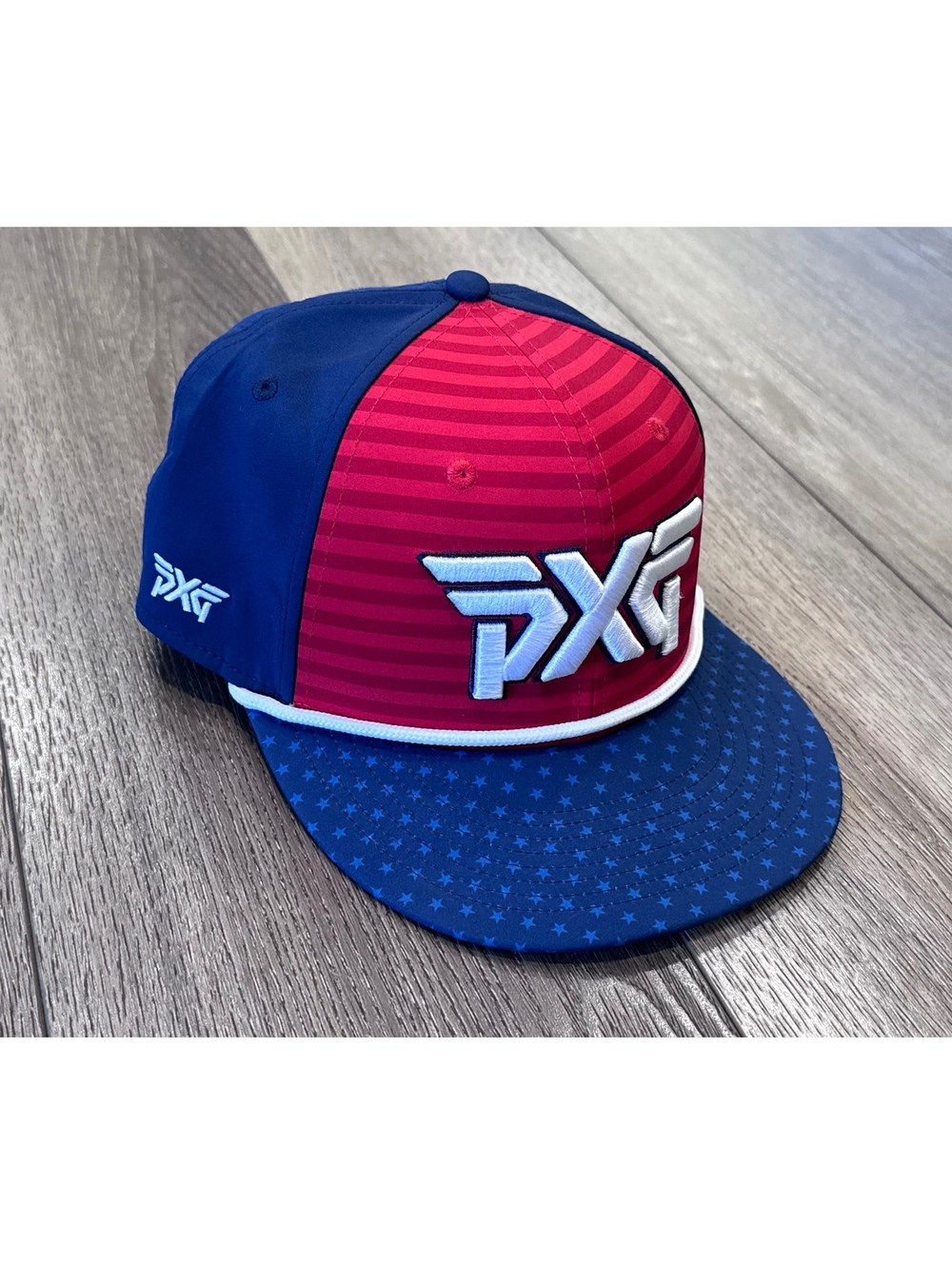 PXG Red and Blue Striped Snapback Hat with Star Pattern Brim